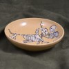 Macabre Hunt on Tan Bowl